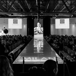 View of Omaha FaRunway photo by Wyatt Photos from Omaha Fashion Weekshion Week's runway from the press pit.